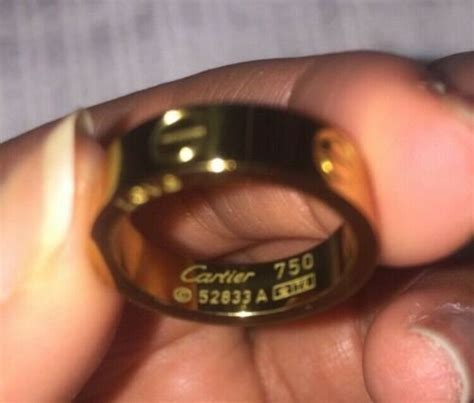 cartier 750 ring 52833a precio|cartier 750 ring 52833a real or fake.